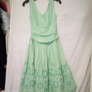 Sundress sixe 6. SL Fashions beautiful and comfortable light green sun dress .